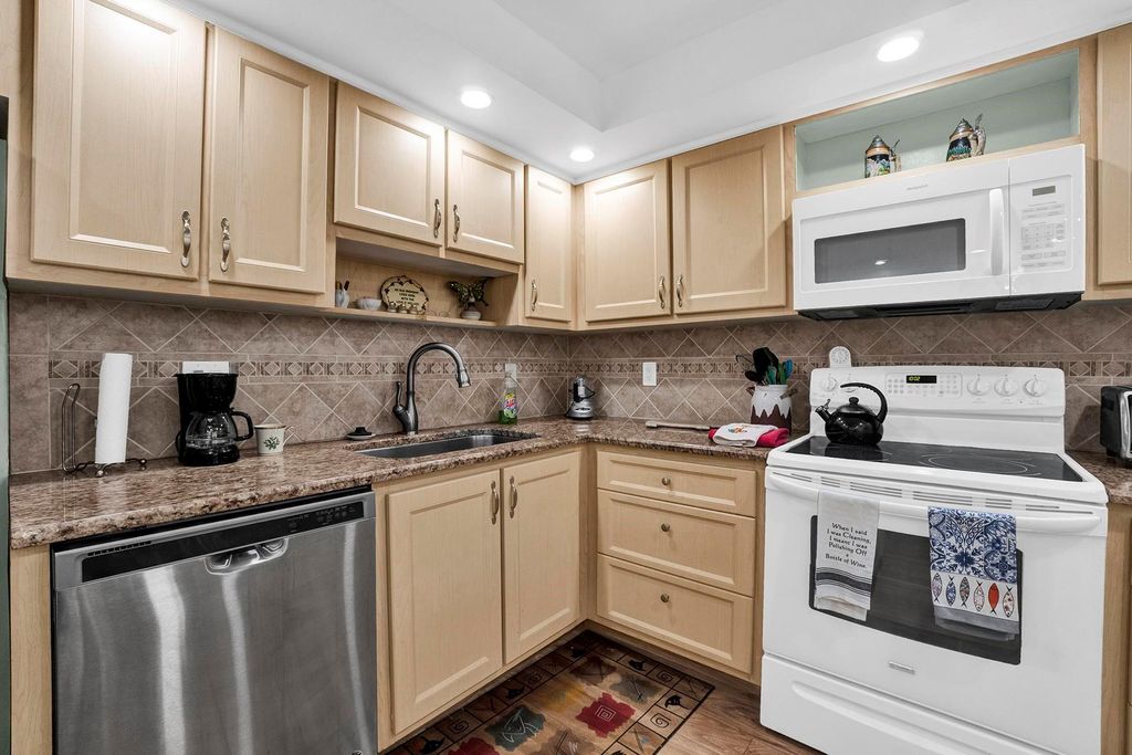 Photo of 823 Cypress Boulevard #203, Pompano Beach, FL 33069 (MLS # F10407282)