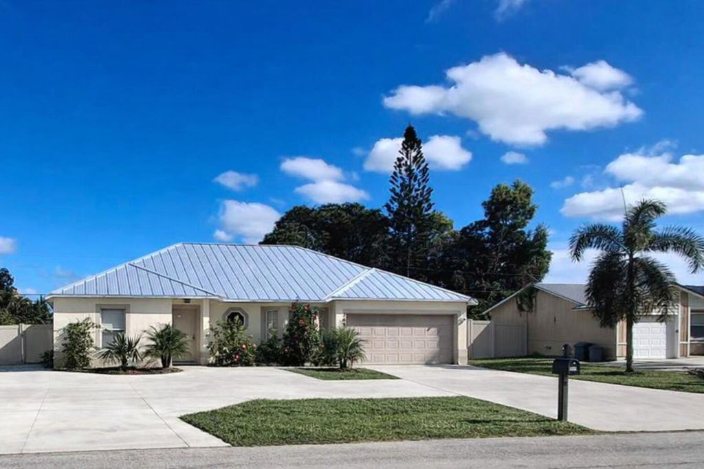 Photo of 365 NW Hibiscus Street, Port Saint Lucie, FL 34983 (MLS # B26005525)