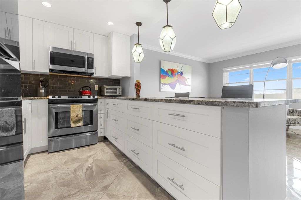 Photo of 487 Grantham F #487, Deerfield Beach, FL 33442 (MLS # F10533665)