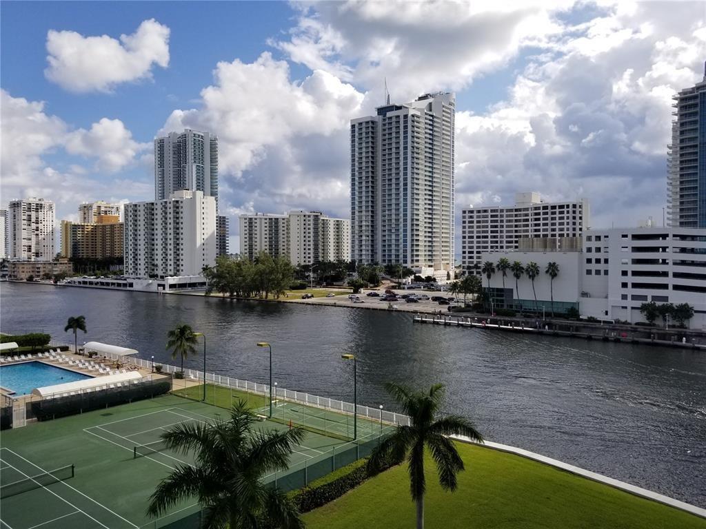 Water views from every room in this bright and spacious unit, partially furnished for your convenience. Large bedroom offers comfort, while the semi covered parking adds ease to your daily routine.
Located in a well maintained building featuring 24-hour security, a fully equipped gym, swimming pool, tennis court, sauna, and clubhouse, etc. Prime location in desirable Three Islands, just minutes to the beach, Aventura Mall, shopping, dining, and more. Don’t miss this opportunity! Easy to show!
