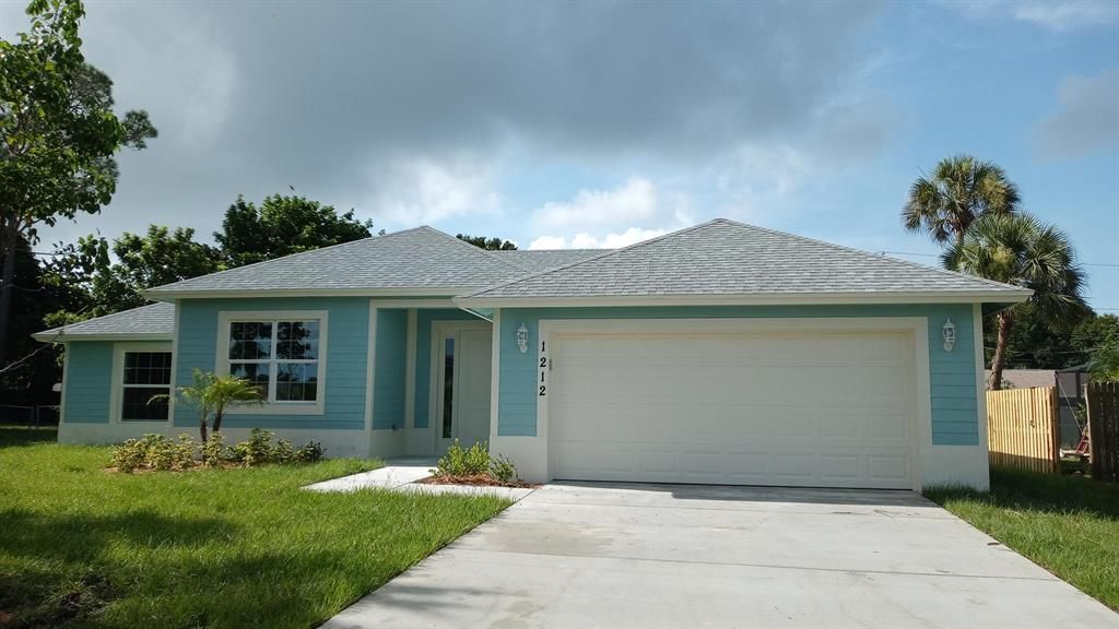 Photo of 1212 SW Wellington Avenue, Port Saint Lucie, FL 34953 (MLS # R10742442)
