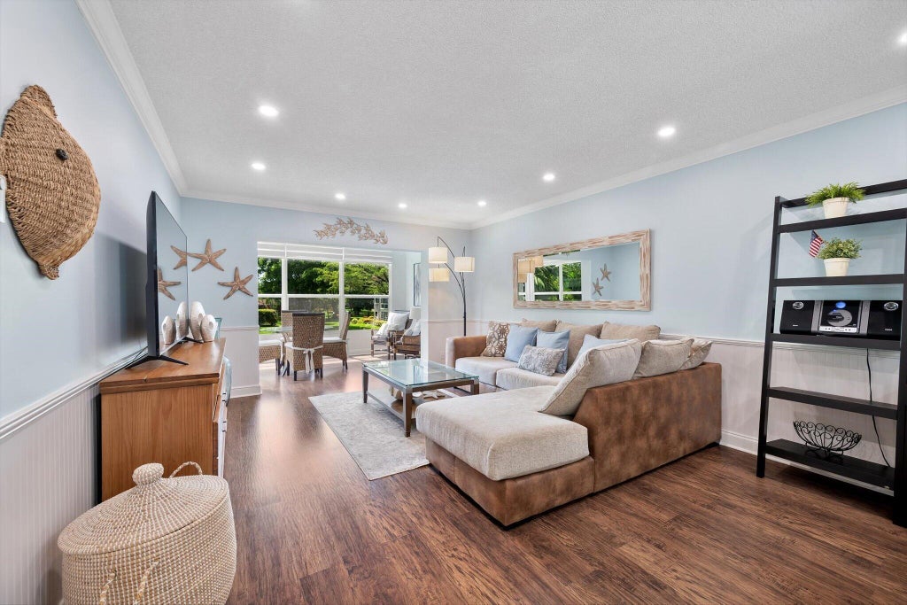 Photo of 5171 W Oakland Park Boulevard #204, Lauderdale Lakes, FL 33313 (MLS # B26076097)