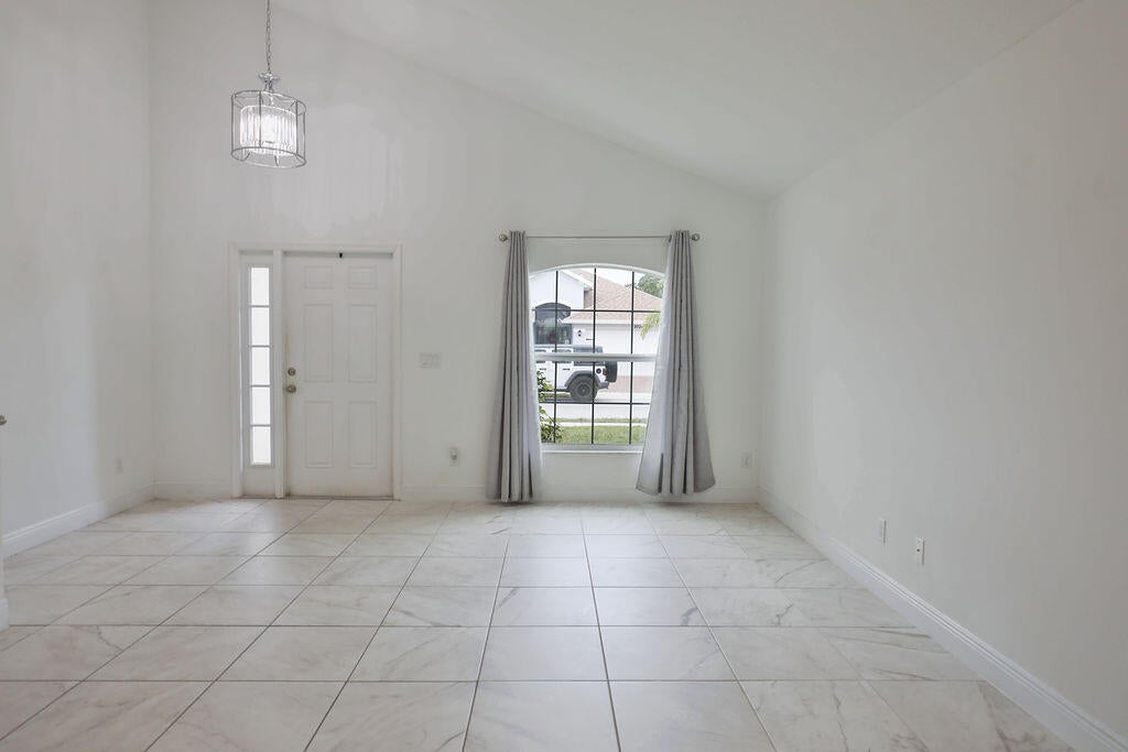 Photo of 9725 Starboard Dr, Fort Pierce, FL 34945 (MLS # R11113096)