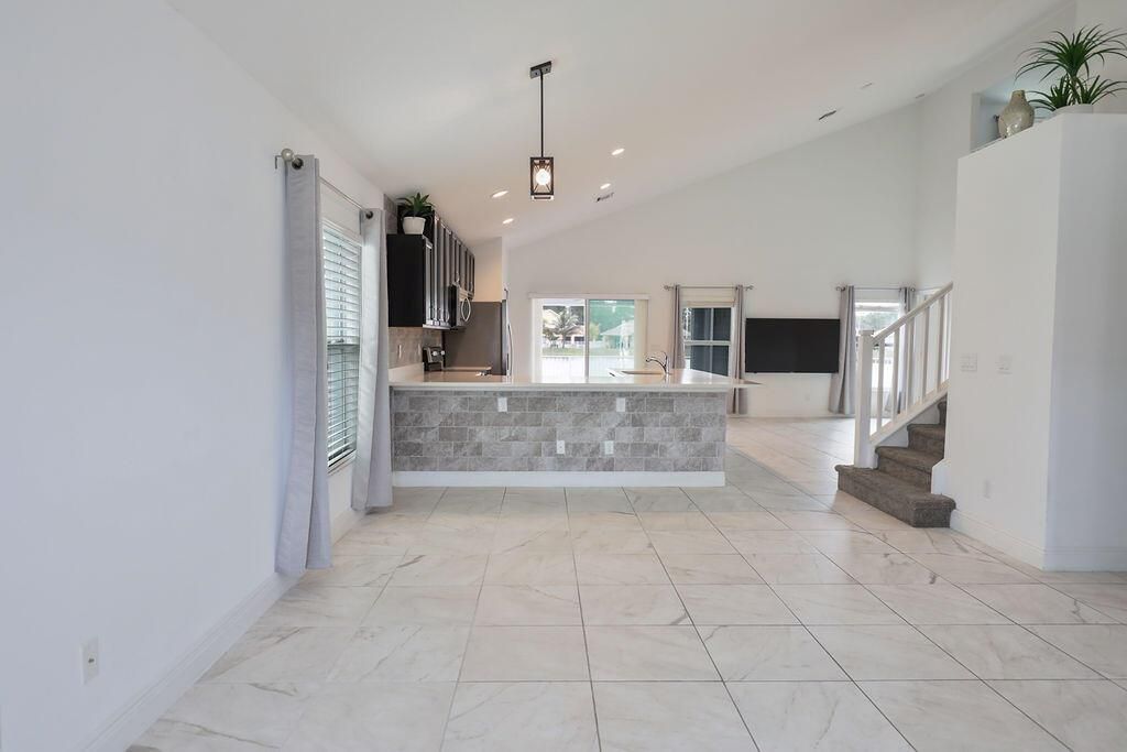 Photo of 9725 Starboard Dr, Fort Pierce, FL 34945 (MLS # R11113096)