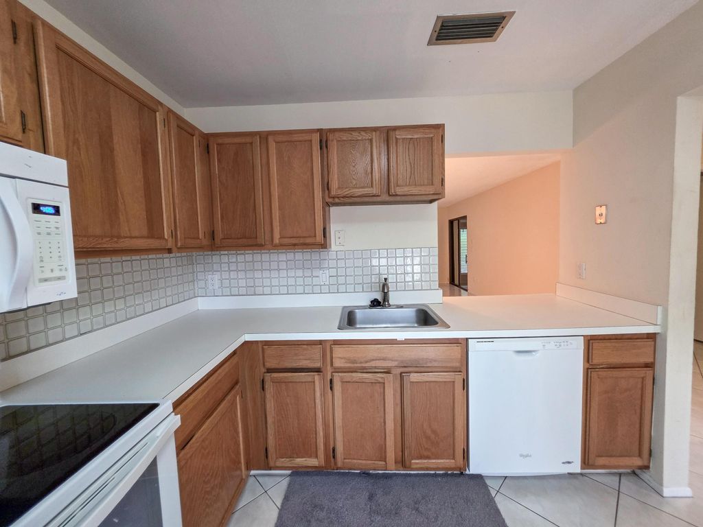 Photo of 103 Rose Bay Court, Royal Palm Beach, FL 33411 (MLS # R11163699)