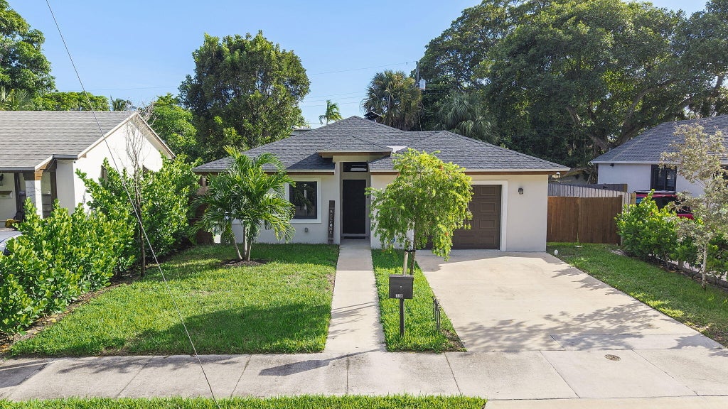Photo of 730 47TH Street, West Palm Beach, FL 33407 (MLS # B26085764)