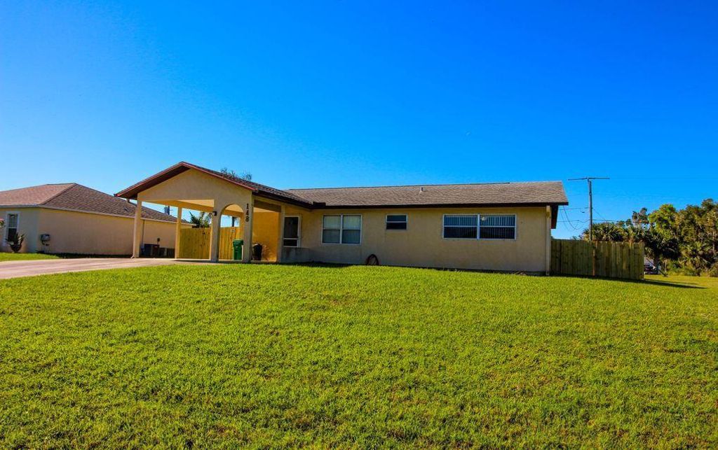 Photo of 148 NW Curtis Street St, Port St Lucie, FL 34983 (MLS # R10709769)