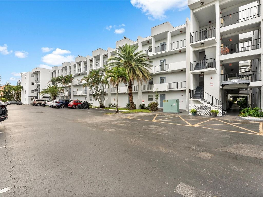 Photo of 2998 Sunrise Lakes Drive E #110, Sunrise, FL 33322 (MLS # B26017112)