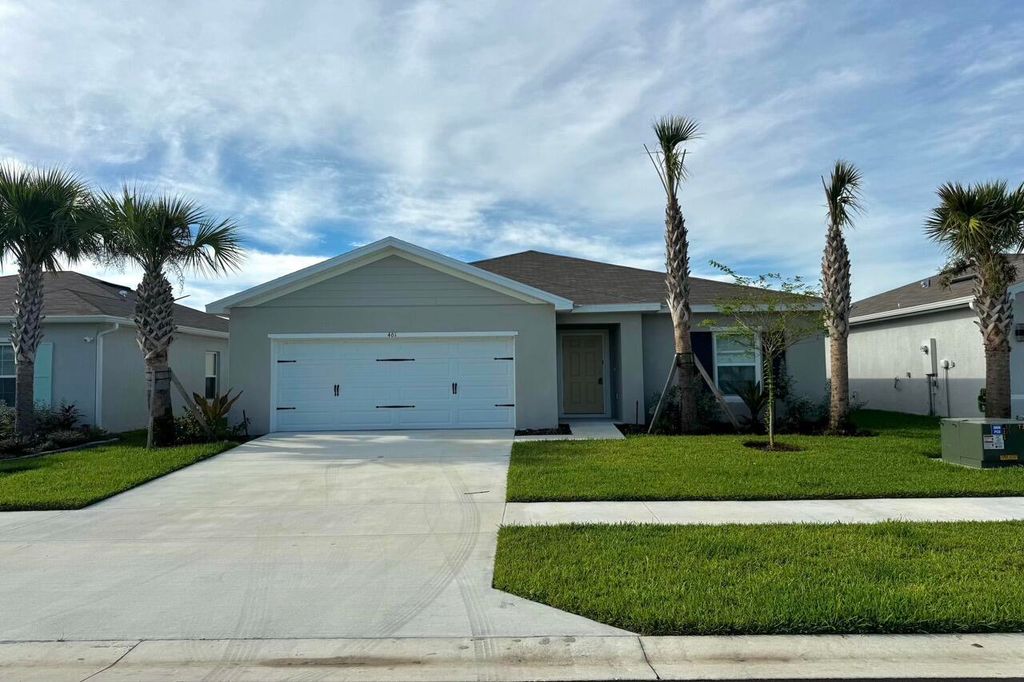 Photo of 461 Cherimoya St, Fort Pierce, FL 34981 (MLS # R11119710)