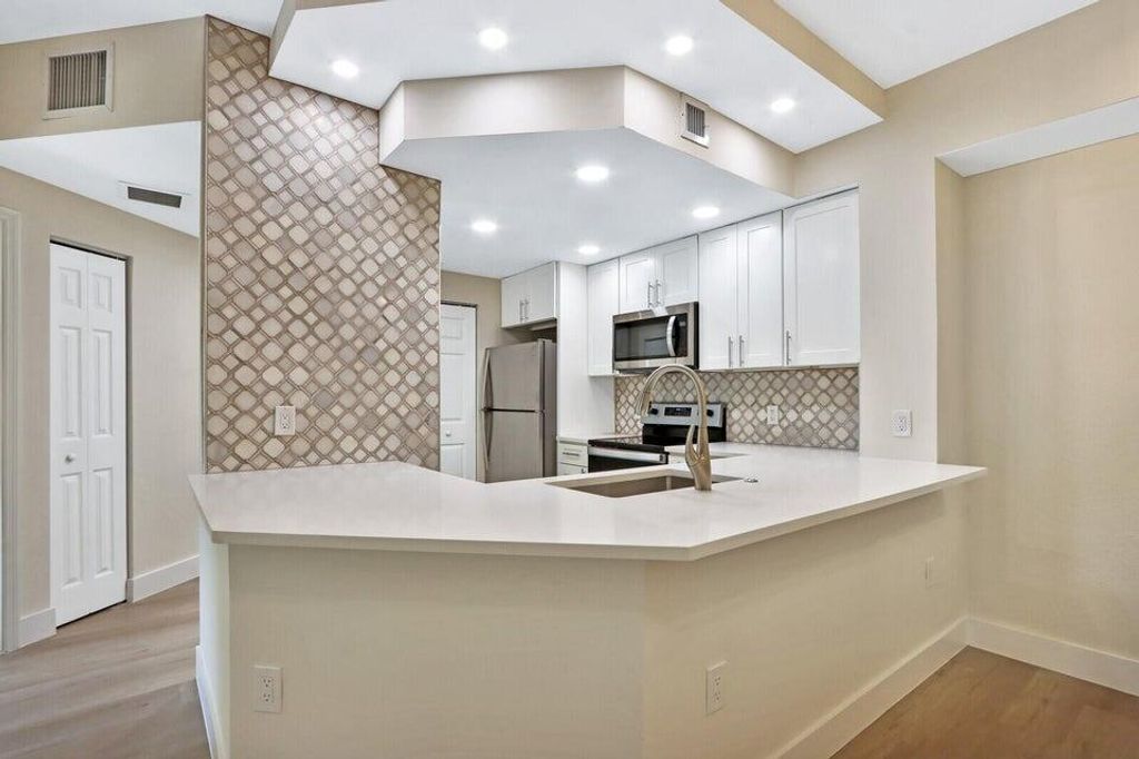 Photo of 2724 Anzio Court #201, Palm Beach Gardens, FL 33410 (MLS # R10903356)