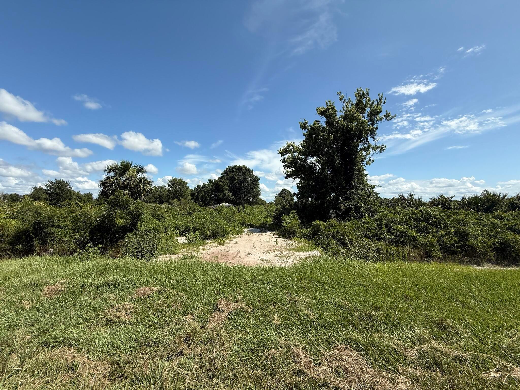 Build or bring your dream home and barn on this beautiful semi-cleared private 1.25 acre. The property already has a culvert in place. There is so much to enjoy in Okeechobee County. The Kissimmee River Preserve State Park West of this area as well is the Kissimmee River. The Kissimmee River flows into Lake Okeechobee and is well known for some of the best fishing. whether you like Fishing, hunting, mudding agriculture or just privacy here you have it all.