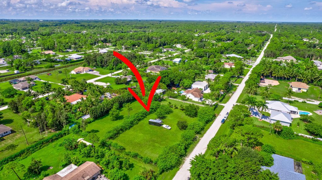 Photo of 14892 88th Place N, The Acreage, FL 33470 (MLS # R11014613)