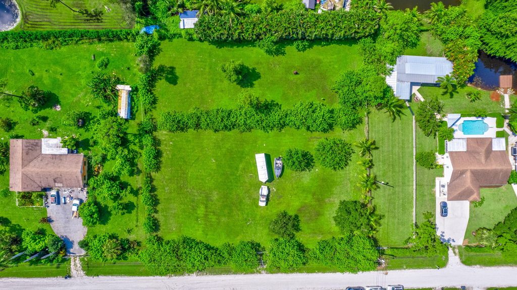 Photo of 14892 88th Place N, The Acreage, FL 33470 (MLS # R11014613)