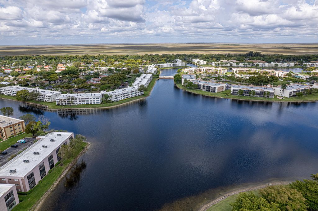 Photo of 10442 E Clairmont Circle #204, Tamarac, FL 33321 (MLS # B26018642)