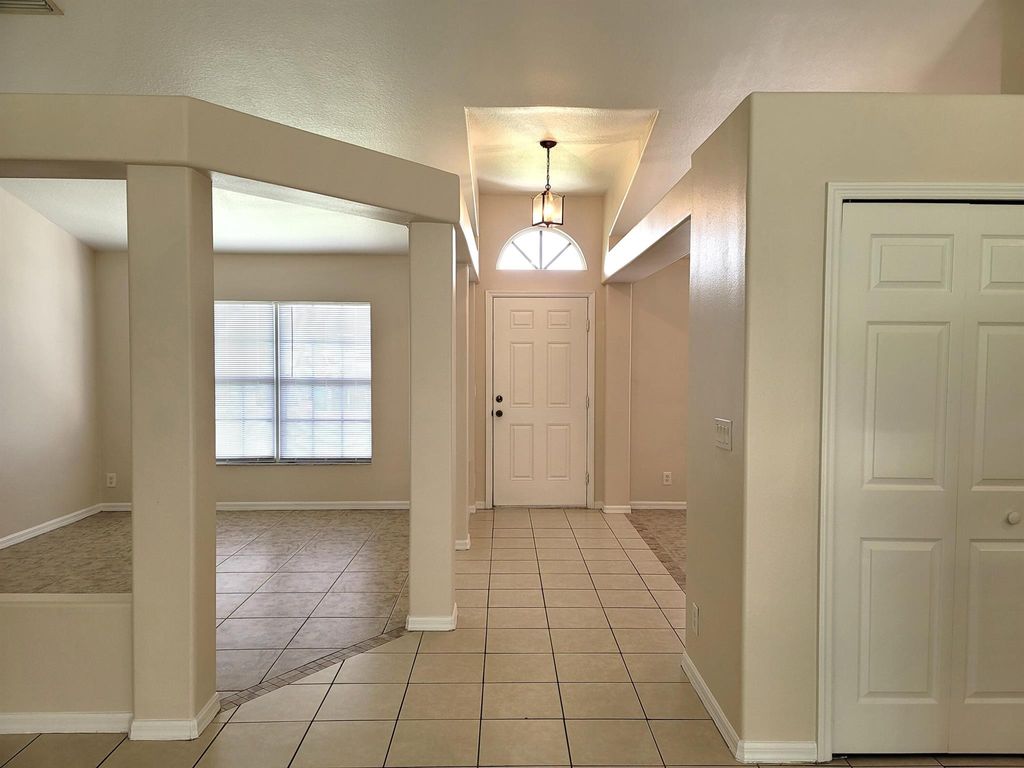 Photo of 3438 SW San Benito Street, Port Saint Lucie, FL 34953 (MLS # R11128124)