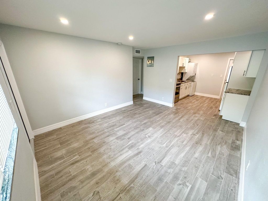 Photo of 1319 Douglass Avenue #102, West Palm Beach, FL 33401 (MLS # B26017004)