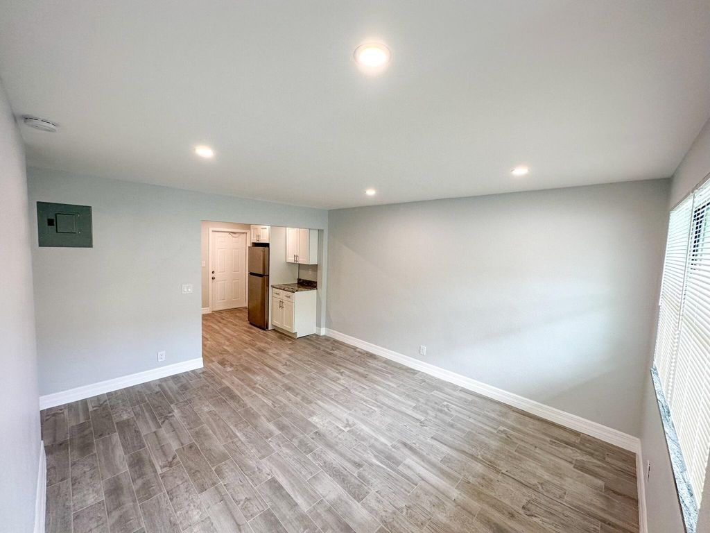 Photo of 1319 Douglass Avenue #102, West Palm Beach, FL 33401 (MLS # B26017004)