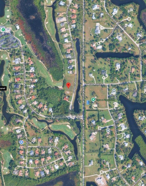 Photo of 1388 SW SQUIRE JOHNS Lane, Palm City, FL 34990 (MLS # B26073185)