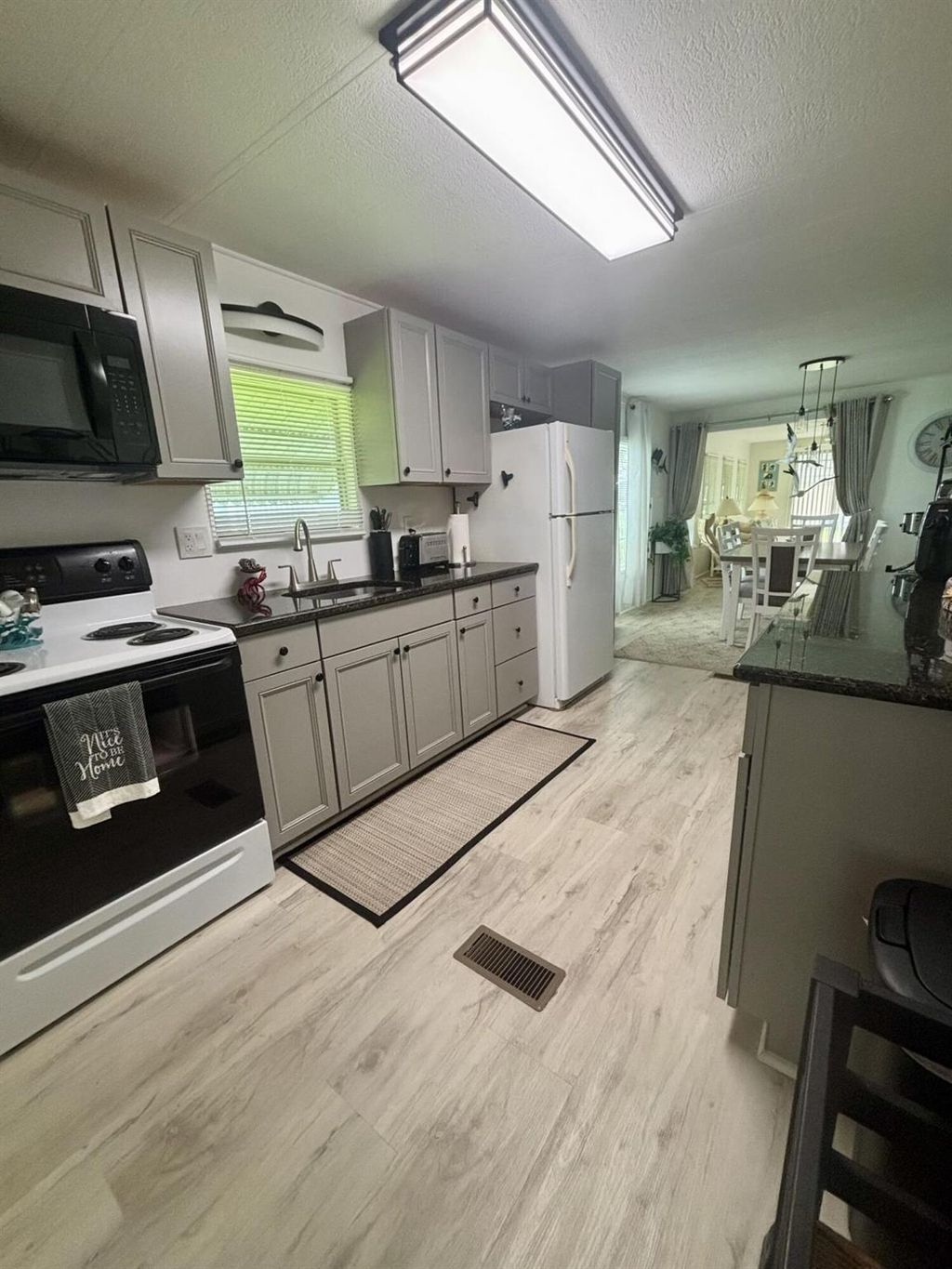 Photo of 3 Don Quixote Ln, Port Saint Lucie, FL 34952 (MLS # R11139895)