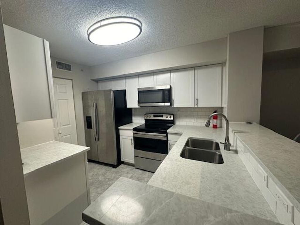 Photo of 7824 Sonoma Springs Circle #203, Lake Worth, FL 33463 (MLS # R11146000)