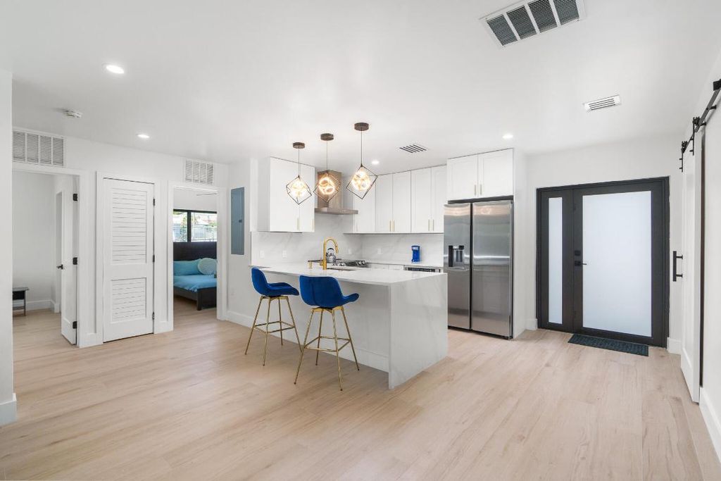 Photo of 303 De Carie Street, Delray Beach, FL 33444 (MLS # R11083540)
