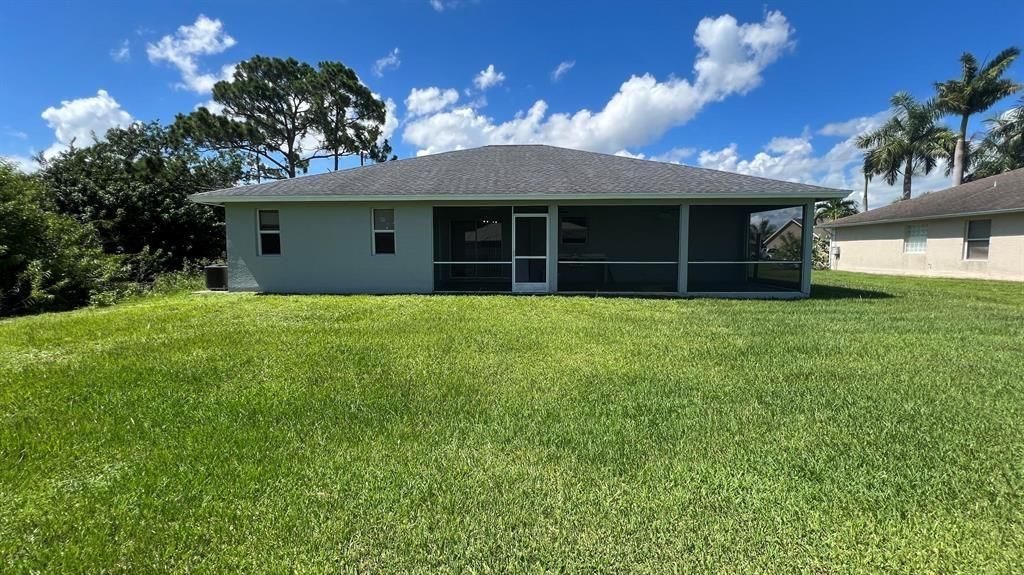 Photo of 1850 SW Effland Avenue, Port Saint Lucie, FL 34953 (MLS # F10447309)