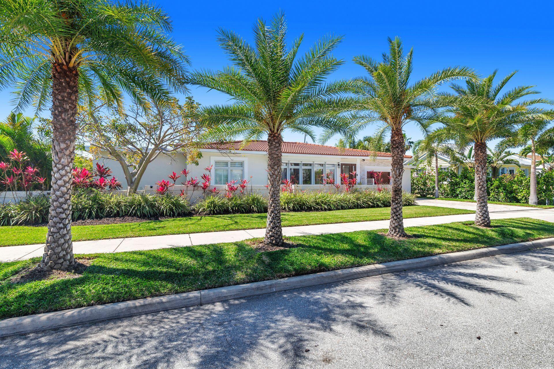Newly renovated 4/3 pool home with 2-car garage (1 attached, 1 detached) on an oversized 11k SF corner lot in the coveted South End (SoSo) neighborhood of West Palm Beach. Boasting over 3,954 total SF and 3,116 SF of A/C living space, this stunning home is just over a block from S. Flagler Drive and the Intracoastal Waterway, across from the Island of Palm Beach. The open-concept floor plan features modern, in-style finishes and decor, making it perfect for today's lifestyle. The fully equipped pool and spacious outdoor areas create an ideal setting for entertaining or relaxing. Whether for a vacation retreat or luxurious living, this home is in one of the most sought-after neighborhoods in West Palm Beach, offering convenience, style, and prime location.