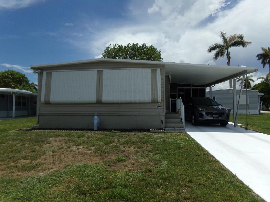 Photo of 12375 S Military Trail #122, Boynton Beach, FL 33436 (MLS # R11107044)