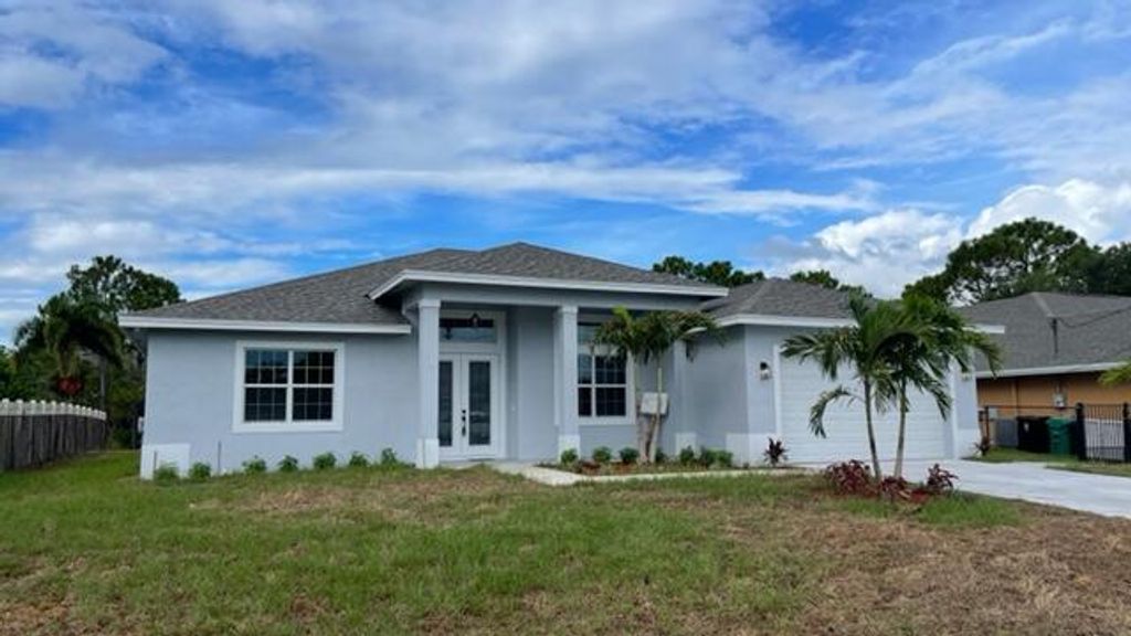 Photo of 2807 SW South Calabria Circle Cir, Port St Lucie, FL 34953 (MLS # R10817231)