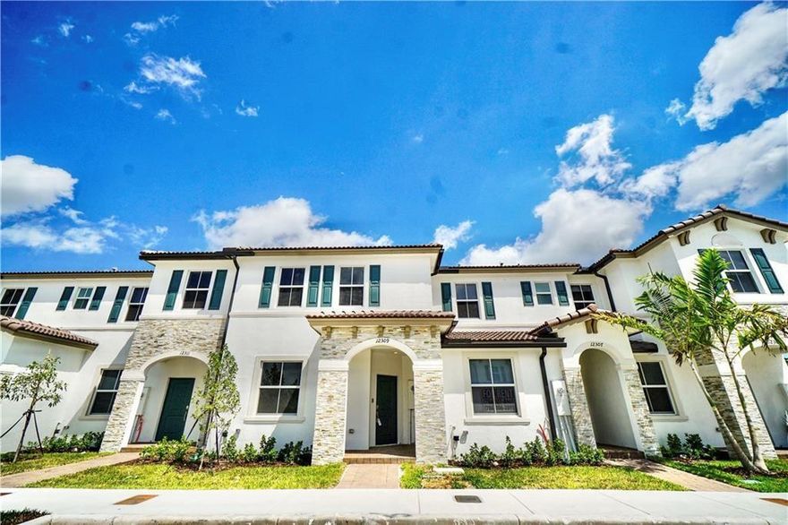 2023 BRAND NEW CONSTRUCTION IN MIAMI: Looking for a Modern- Smart Home? Look No Further! Gorgeous 3 bed/ 2.5 bath, Townhome located in highly sought after Gated Community; Westview. LOW HOA ONLY $125/ MONTH! Still owned by the Original Owner! Property has IMPACT Doors & Windows for protection. Huge open-floor Layout, its one of the Biggest Models in the community. All bedrooms are located upstairs on Second Floor with a Water View. Westview is in the middle of everywhere walking distance to Miami Dade College North Campus, Airport, Access to I95 & Turnpike, 10 miles to downtown Miami. Plenty of parking space located on the front. Backyard is fenced & private, perfect for entertainment. Lots of World-Class Amenities being offered: Pool, Fitness Room, Clubhouse, Dog Park & much more to come!