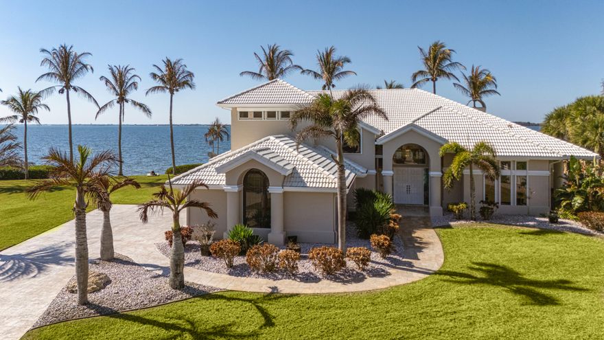 An exceptional offering of three cul-de-sac properties forming a private coastal compound. Two premier waterfront lots command panoramic views spanning over a mile across the Indian River, showcasing unforgettable sunsets. A third, non-riverfront lot with water views enhances privacy and a unique grand estate potential.
Direct deep-water access to the Sebastian Inlet with no low fixed bridges. Private dock accommodates a 45-foot yacht. Reinforced seawalls on both waterfront parcels.
Marble floors, staircase, driveway, walkways & pool deck. Fireplace and private outdoor shower. Electric shutters throughout. Private beach access. No HOA. Furnishings negotiable.
.