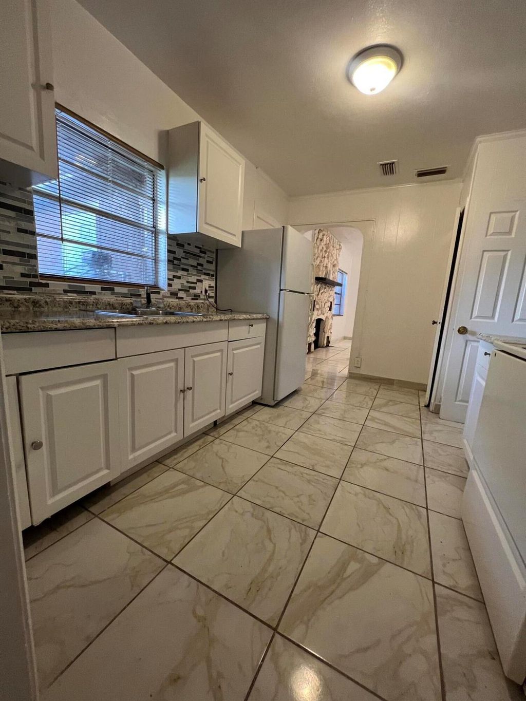 Photo of 3404 Avenue O Avenue, Fort Pierce, FL 34950 (MLS # R10926017)