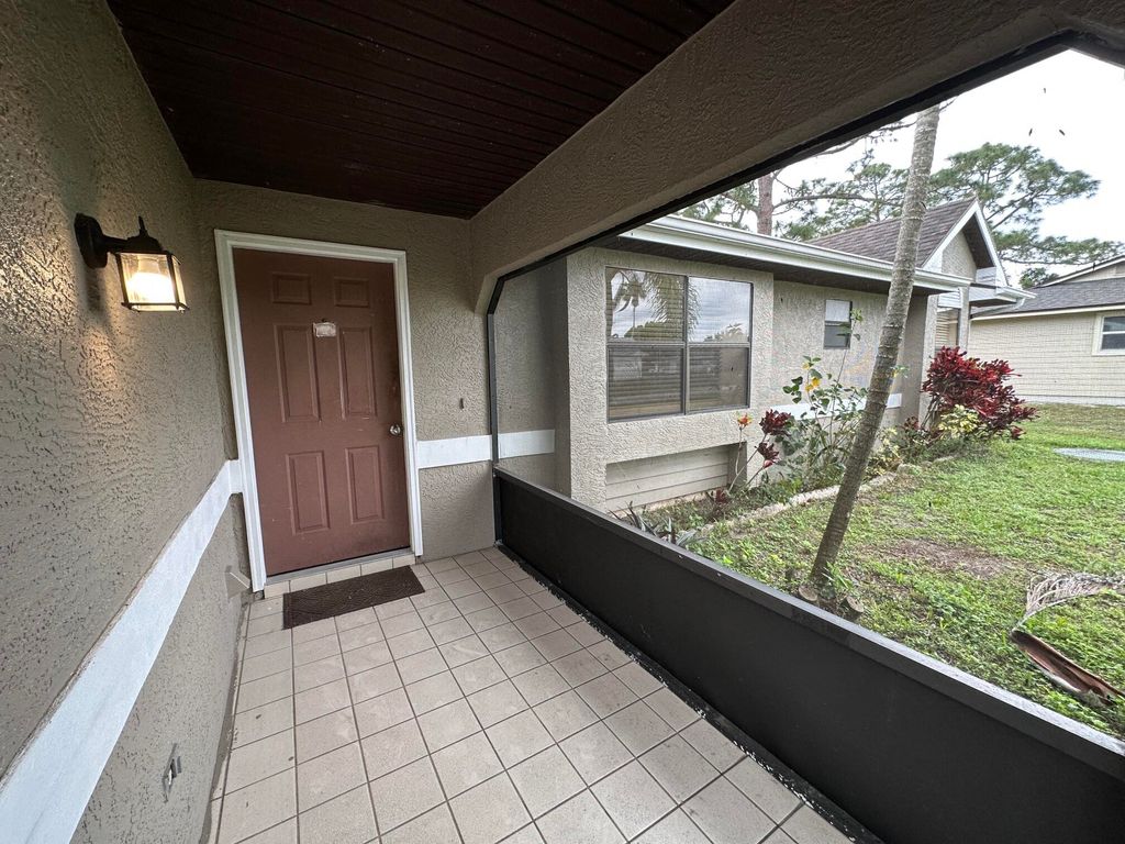 Photo of 340 NW Placid Avenue, Port Saint Lucie, FL 34983 (MLS # R11065736)