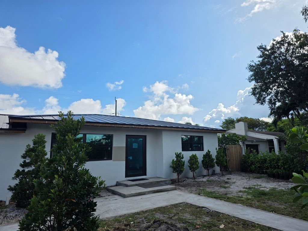 Photo of 329 Laurie Road, West Palm Beach, FL 33405 (MLS # B26024392)