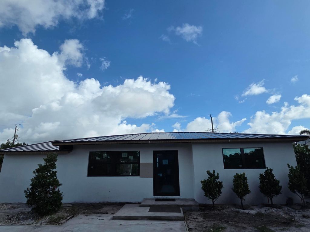 Photo of 329 Laurie Road, West Palm Beach, FL 33405 (MLS # B26024392)