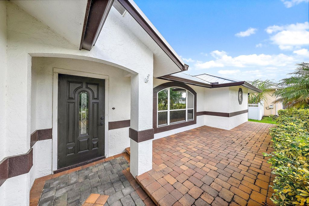 Photo of 4649 SW Dactyl Street, Port Saint Lucie, FL 34953 (MLS # R11034516)