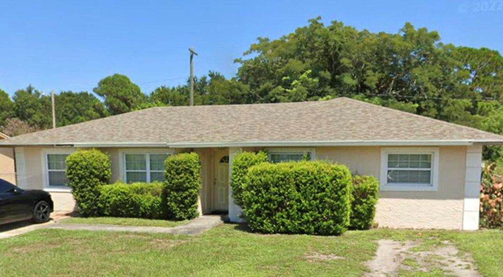 Photo of 2704 Walker Drive, Fort Pierce, FL 34946 (MLS # R10899167)