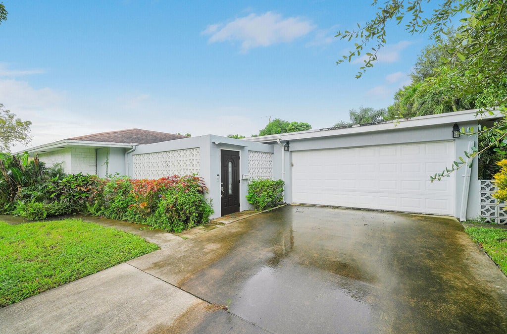 Photo of 1612 42nd Street, West Palm Beach, FL 33407 (MLS # B26085012)