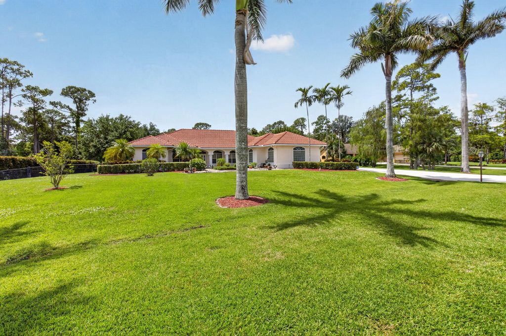 Photo of 9774 Saddle Court, Wellington, FL 33467 (MLS # B26022416)