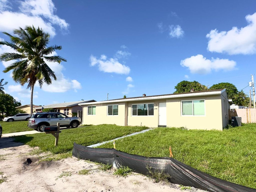 Photo of 6448 Lawrence Road, Lake Worth, FL 33462 (MLS # R10999127)