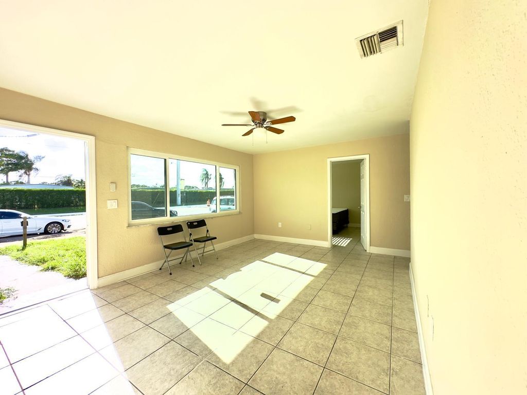 Photo of 6448 Lawrence Road, Lake Worth, FL 33462 (MLS # R10999127)