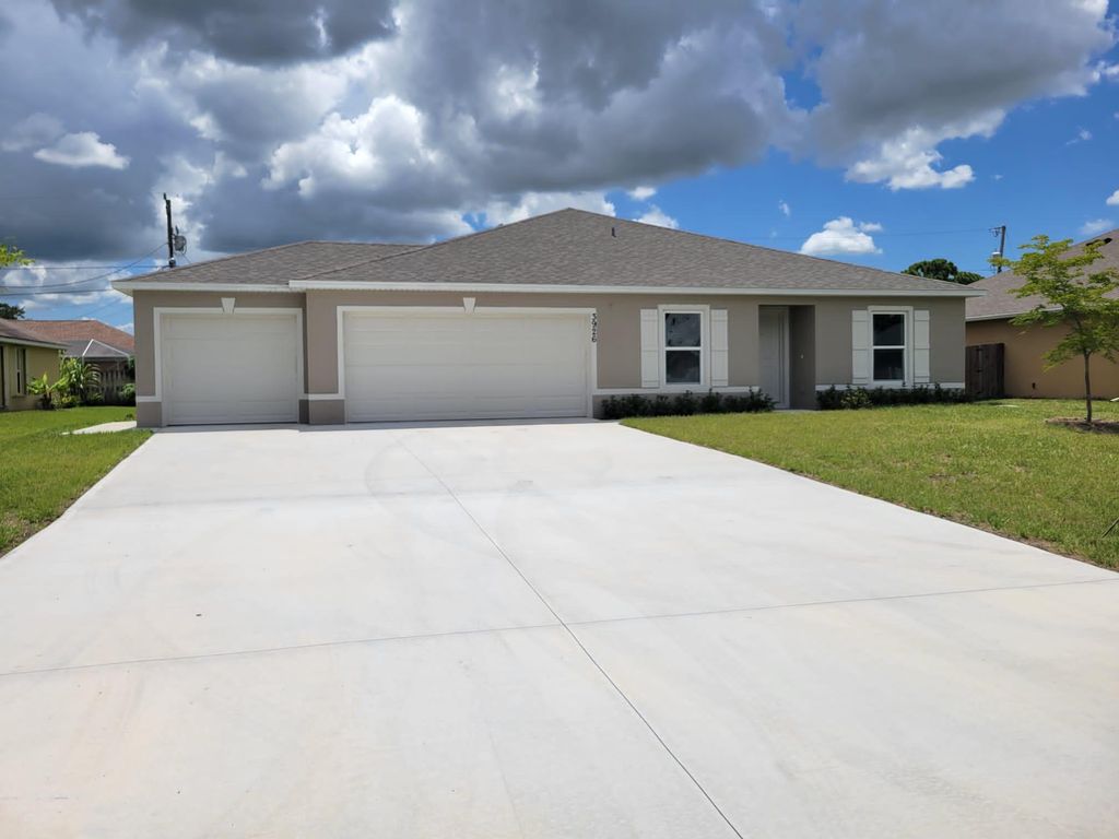 Photo of 3926 SW Kakopo Street, Port St Lucie, FL 34953 (MLS # R10911725)