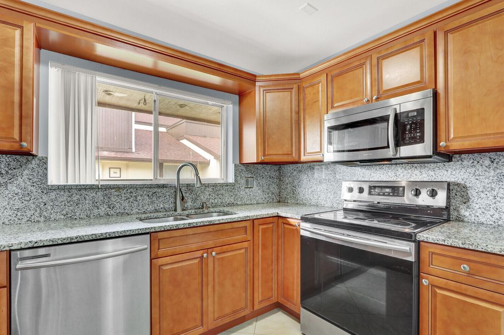 Photo of 5272 Bosque Lane #31, West Palm Beach, FL 33415 (MLS # B26005878)