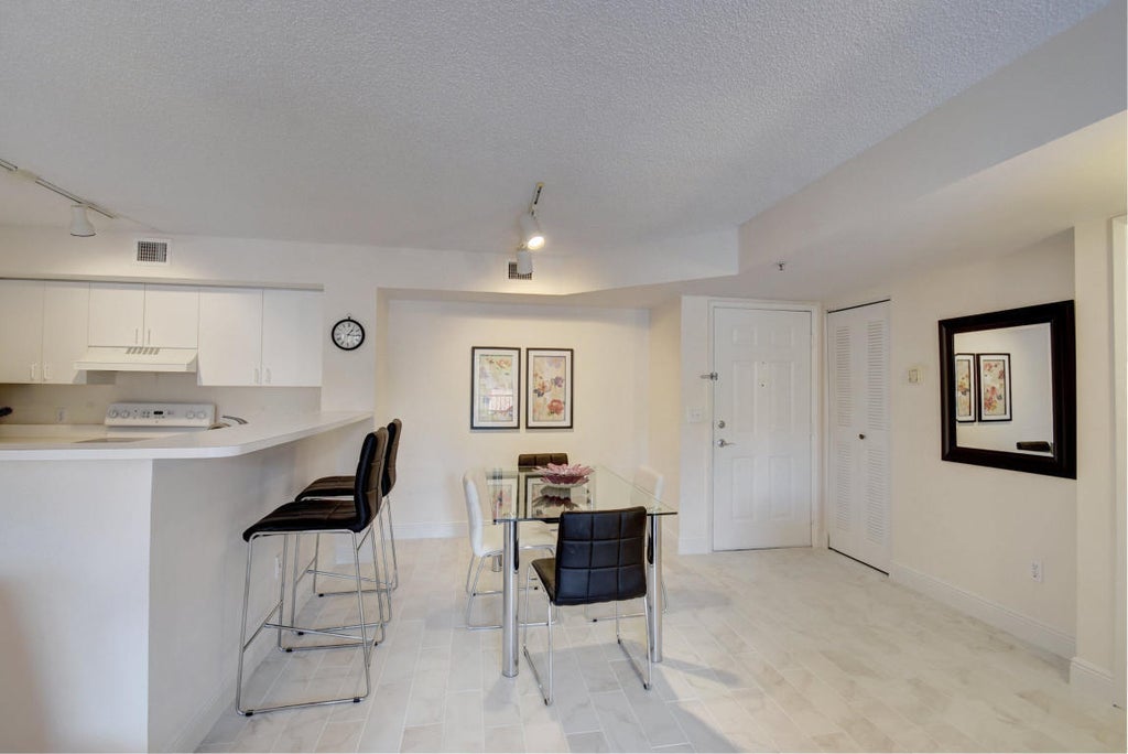 Photo of 135 Yacht Club Way #207, Hypoluxo, FL 33462 (MLS # B26075998)
