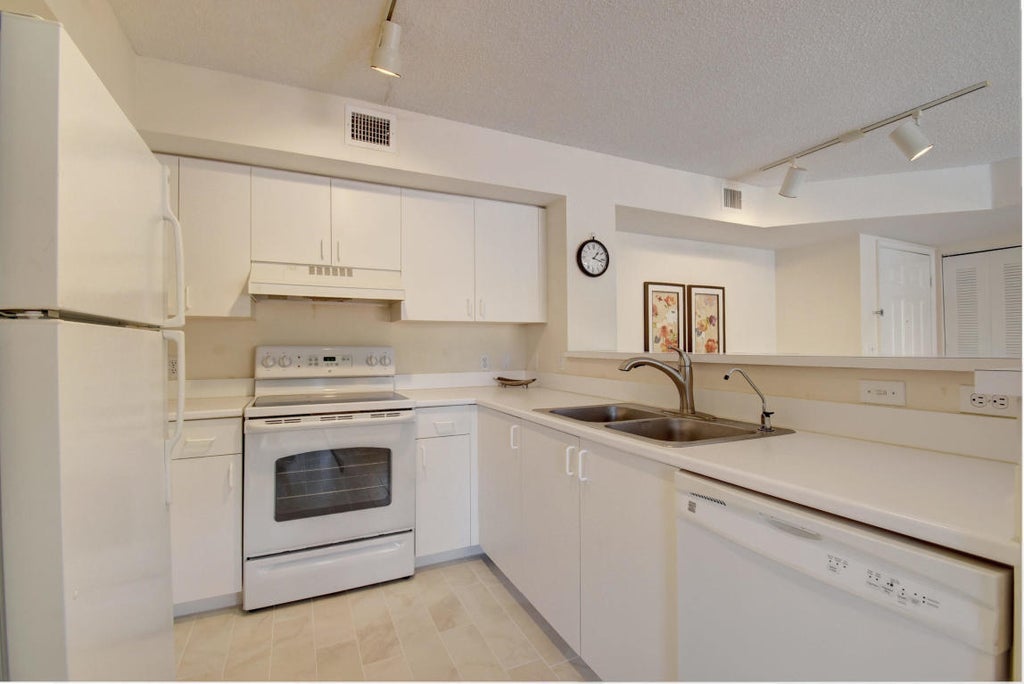 Photo of 135 Yacht Club Way #207, Hypoluxo, FL 33462 (MLS # B26075998)
