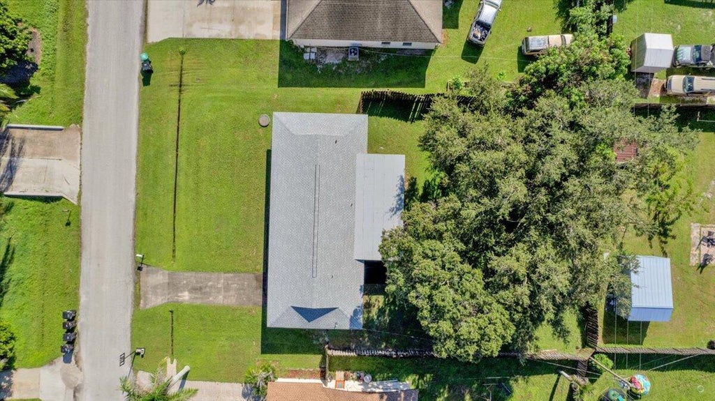 Photo of 412 SE Dalva Avenue, Port Saint Lucie, FL 34984 (MLS # B26076860)