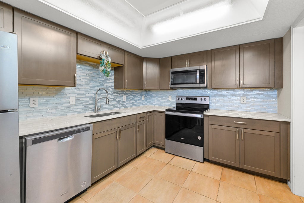 Photo of 4500 Gefion Court #302, Lake Worth, FL 33467 (MLS # B26076803)