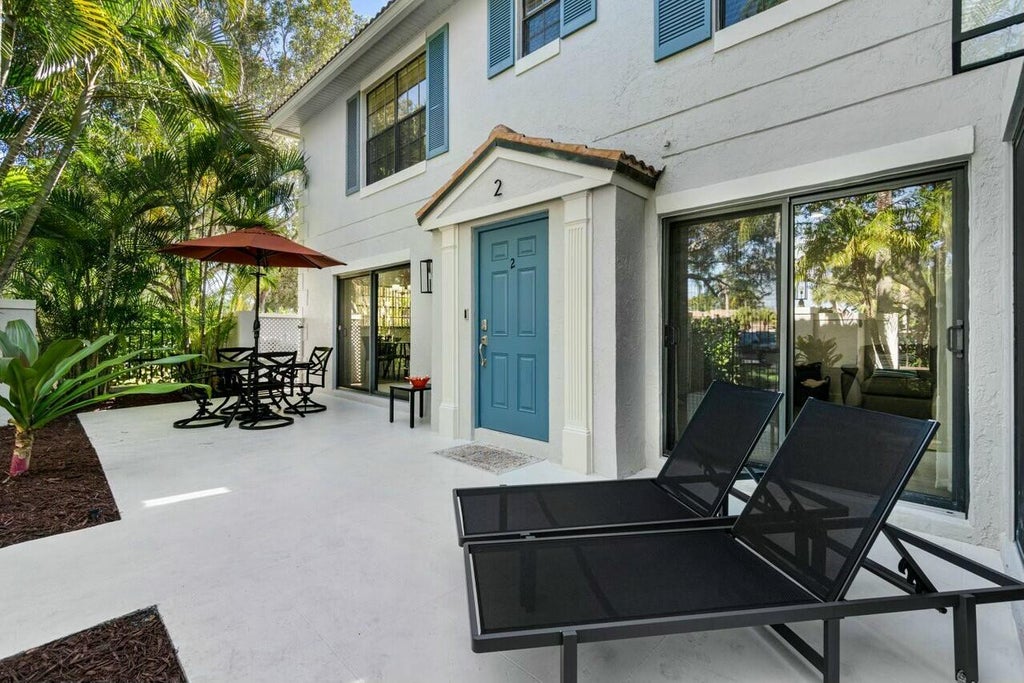 Photo of 355 Prestwick Circle #2, Palm Beach Gardens, FL 33418 (MLS # R11049993)