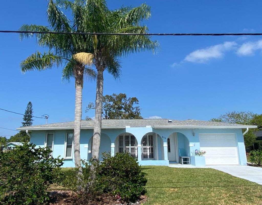 Photo of 856 SE Degan Drive, Port Saint Lucie, FL 34983 (MLS # R10985980)