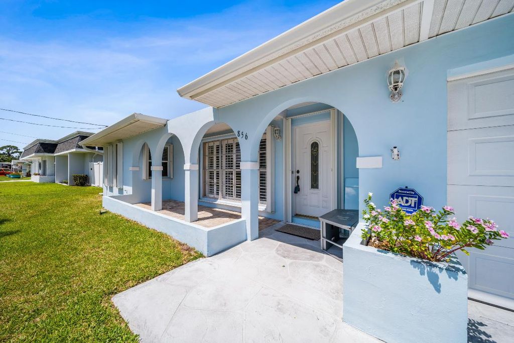 Photo of 856 SE Degan Drive, Port Saint Lucie, FL 34983 (MLS # R10985980)